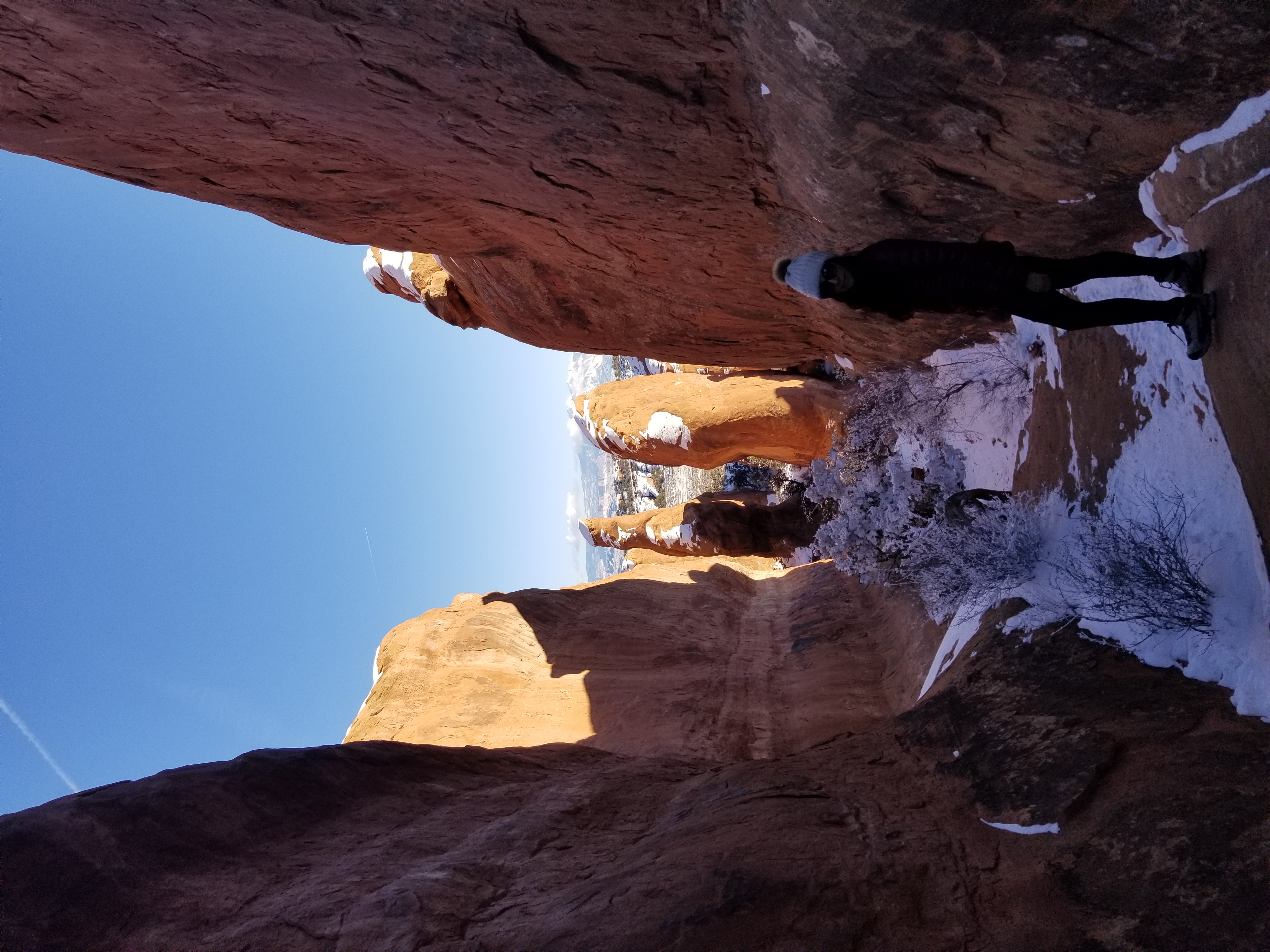 Walking between the sandstone fins of Arches NP