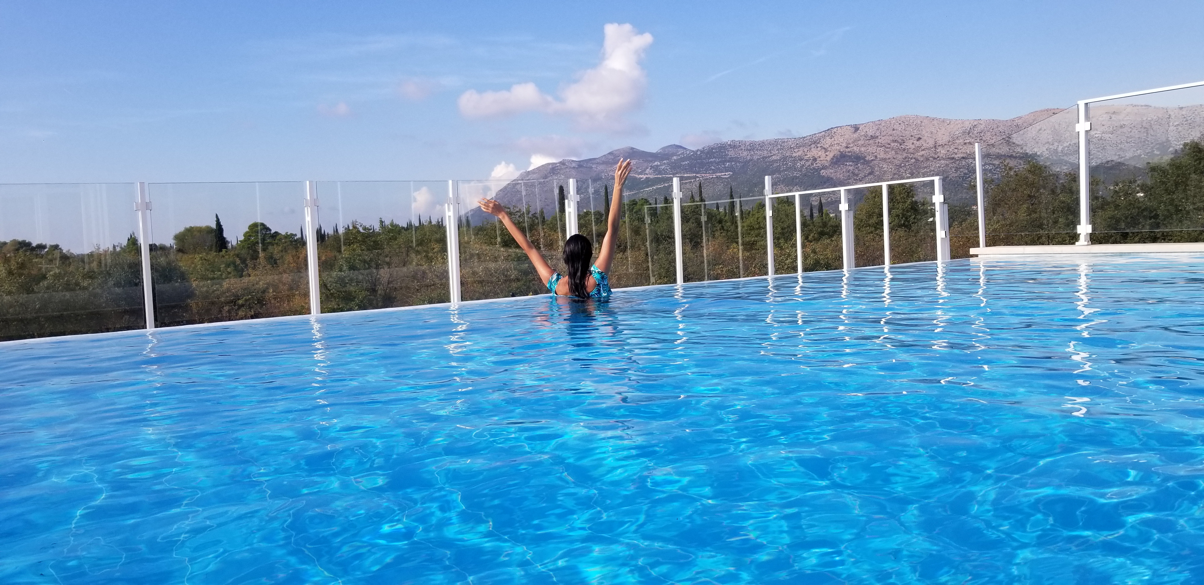 Zelzah tries not to look cold in the (unheated) infinity pool at our hotel near Dubrovnik