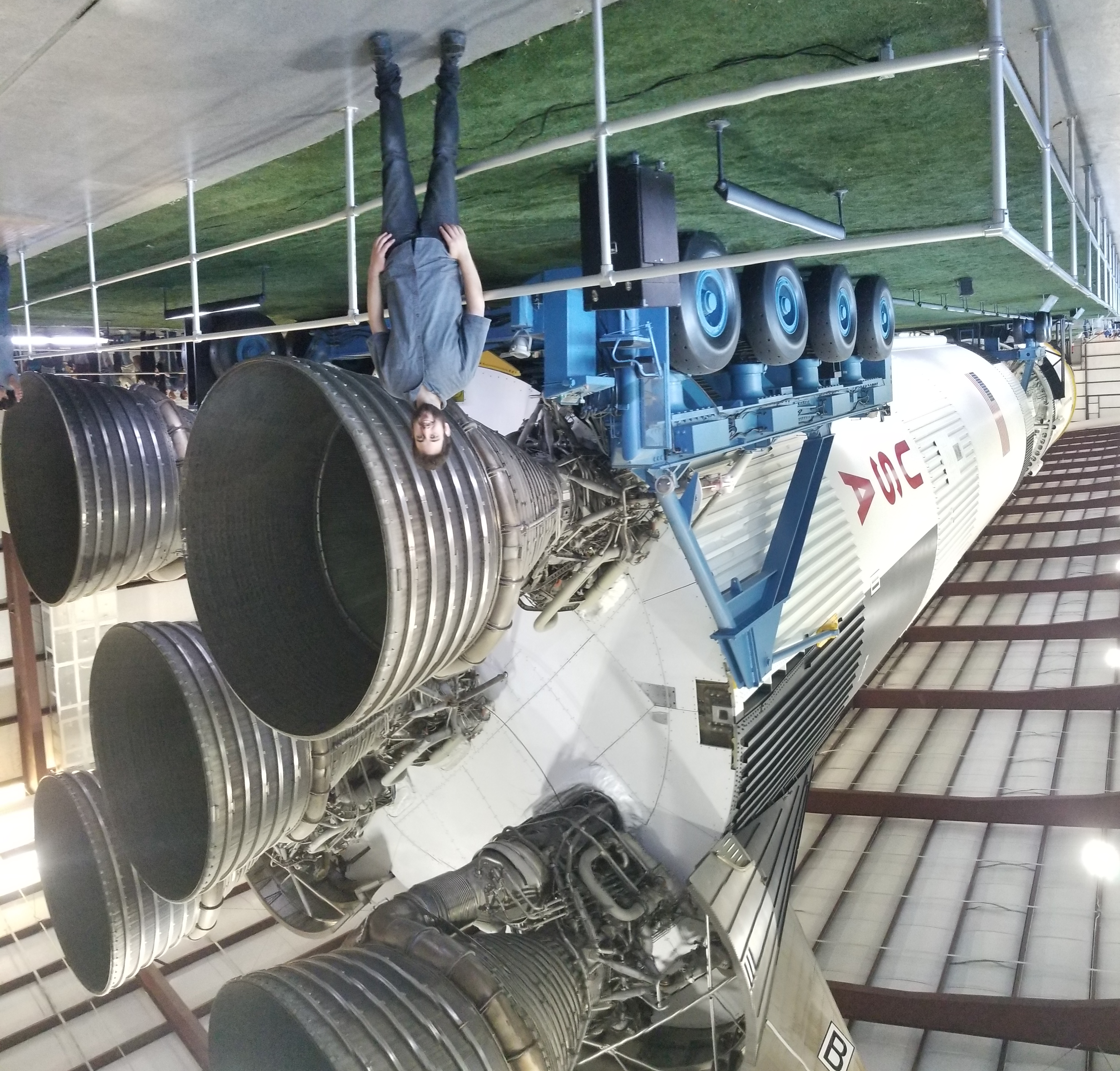 Standing in front of a Saturn V rocket at the Houston Space Center.