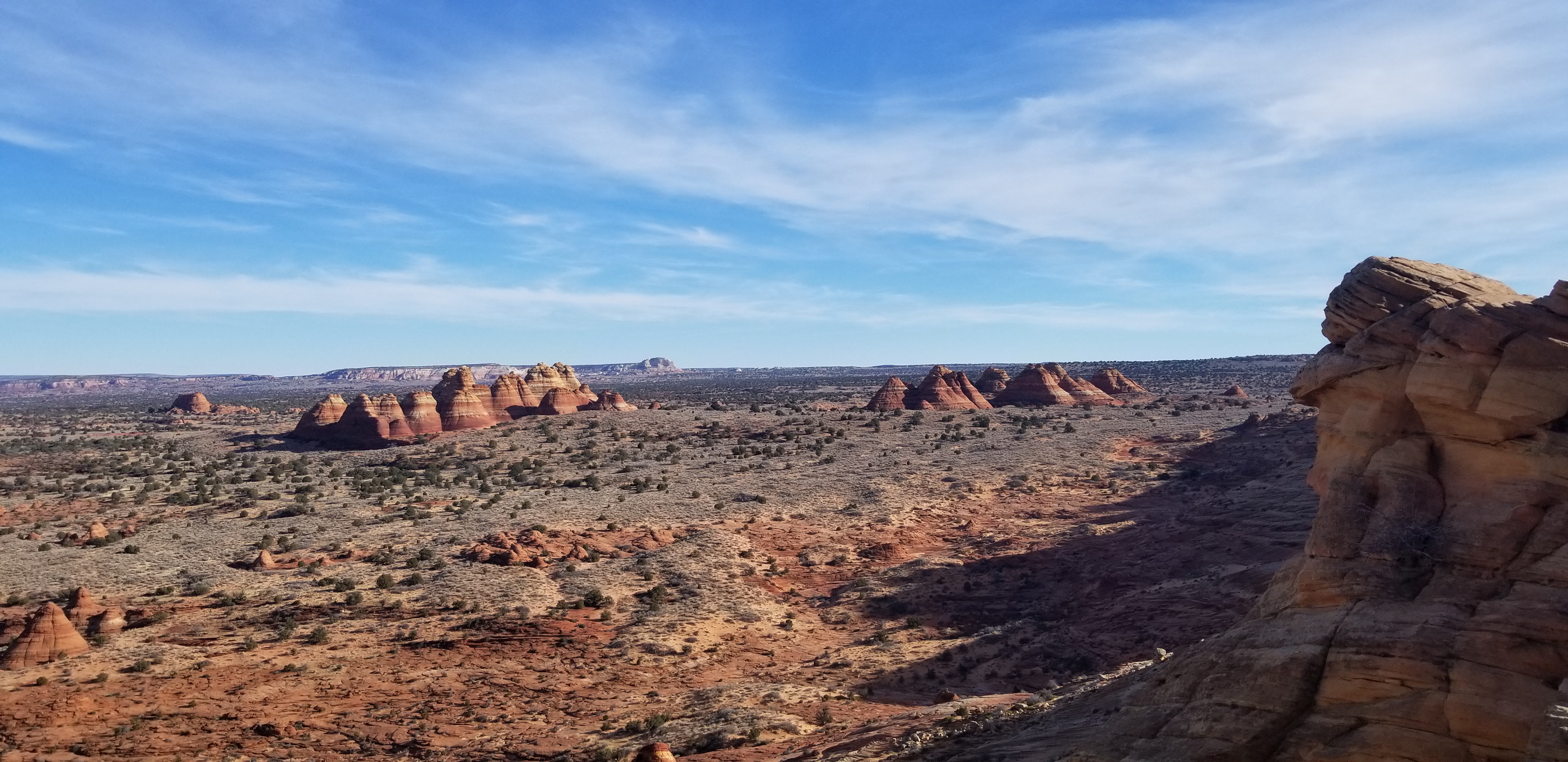 Picture of a rock formation known as "The Tepees" seen in the distance