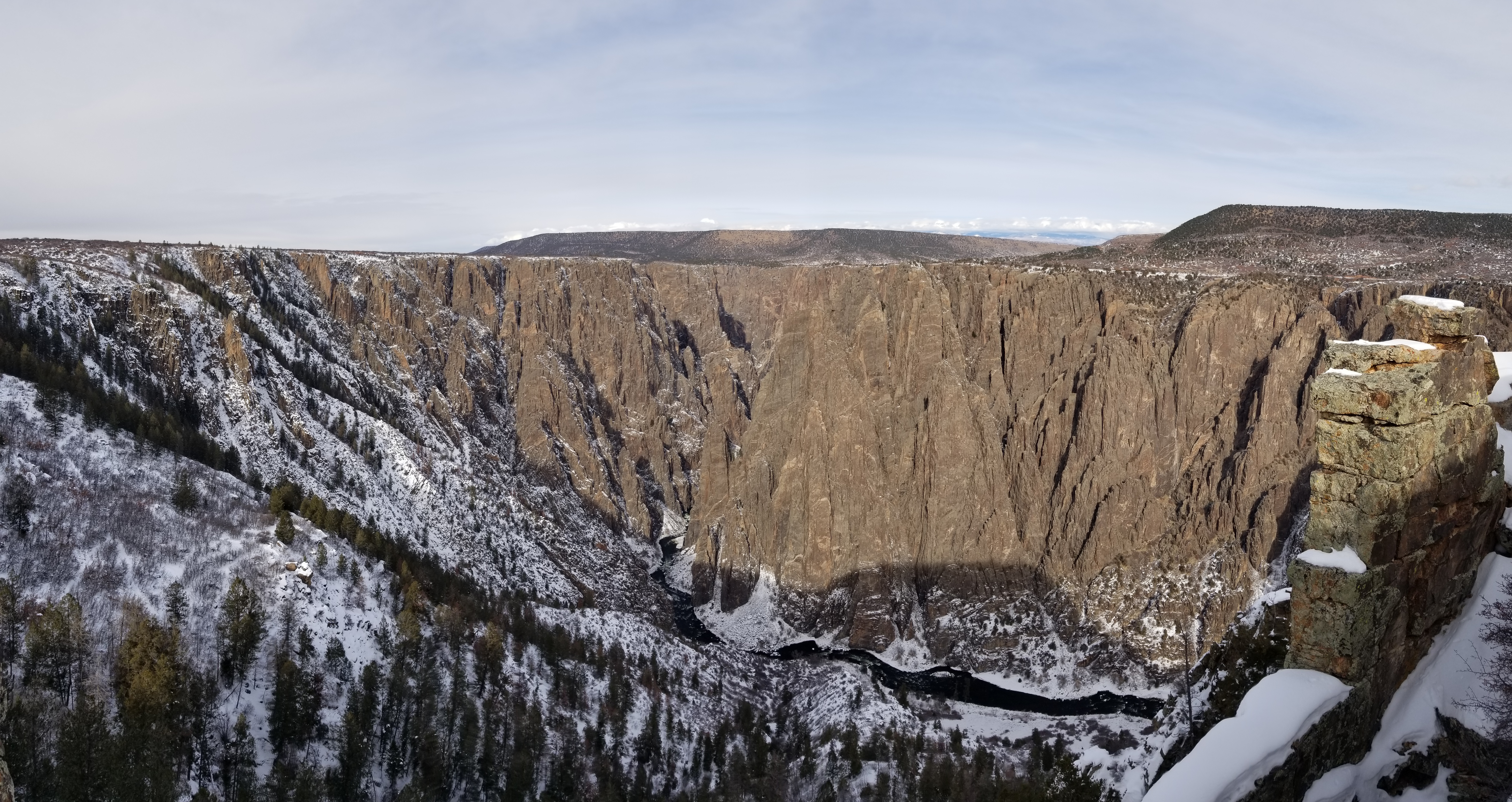 The Gunnison River cutting away at the canyon