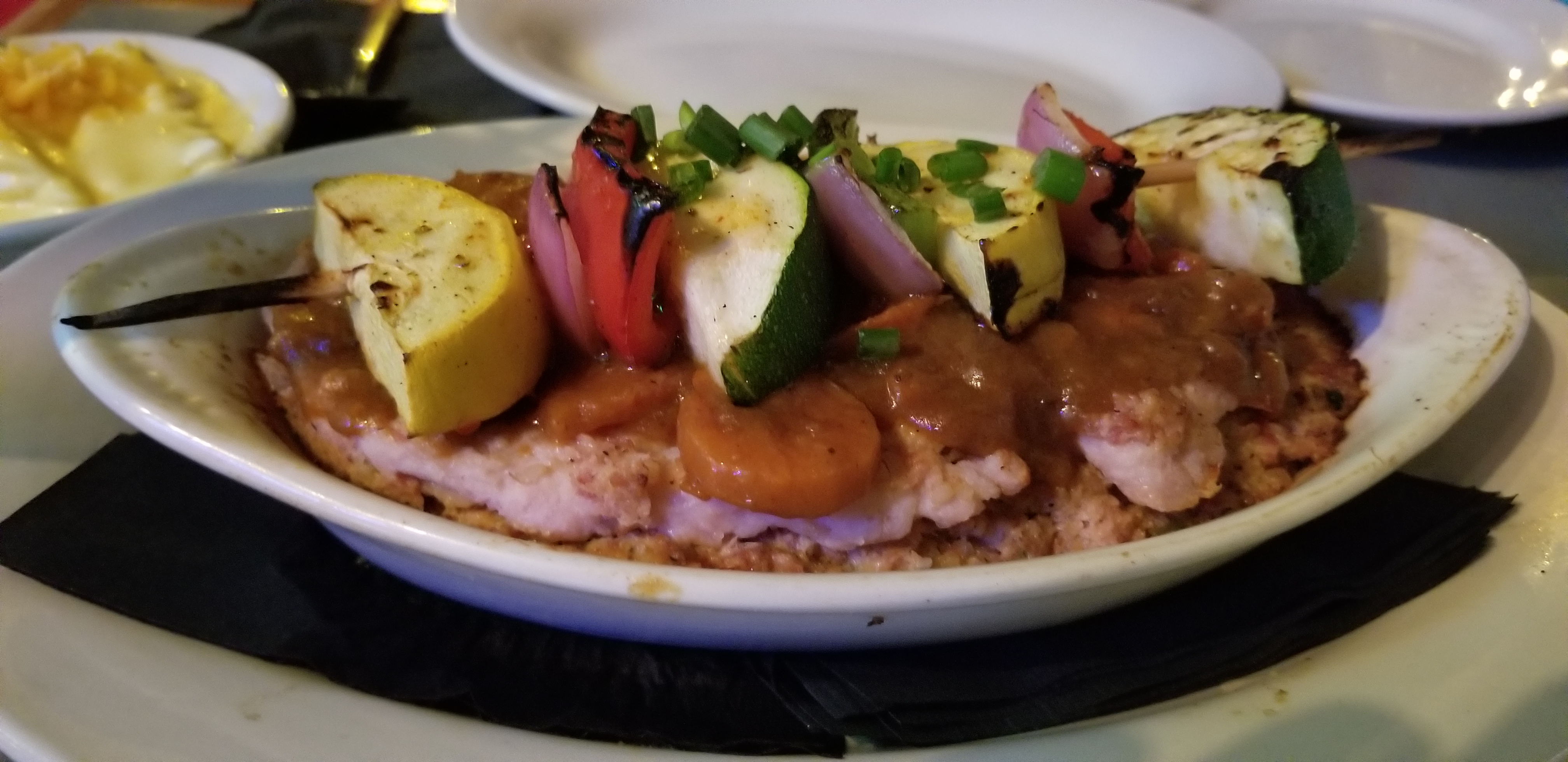 Alligator filet on a bed of boudin. The alligator was surprisingly good!