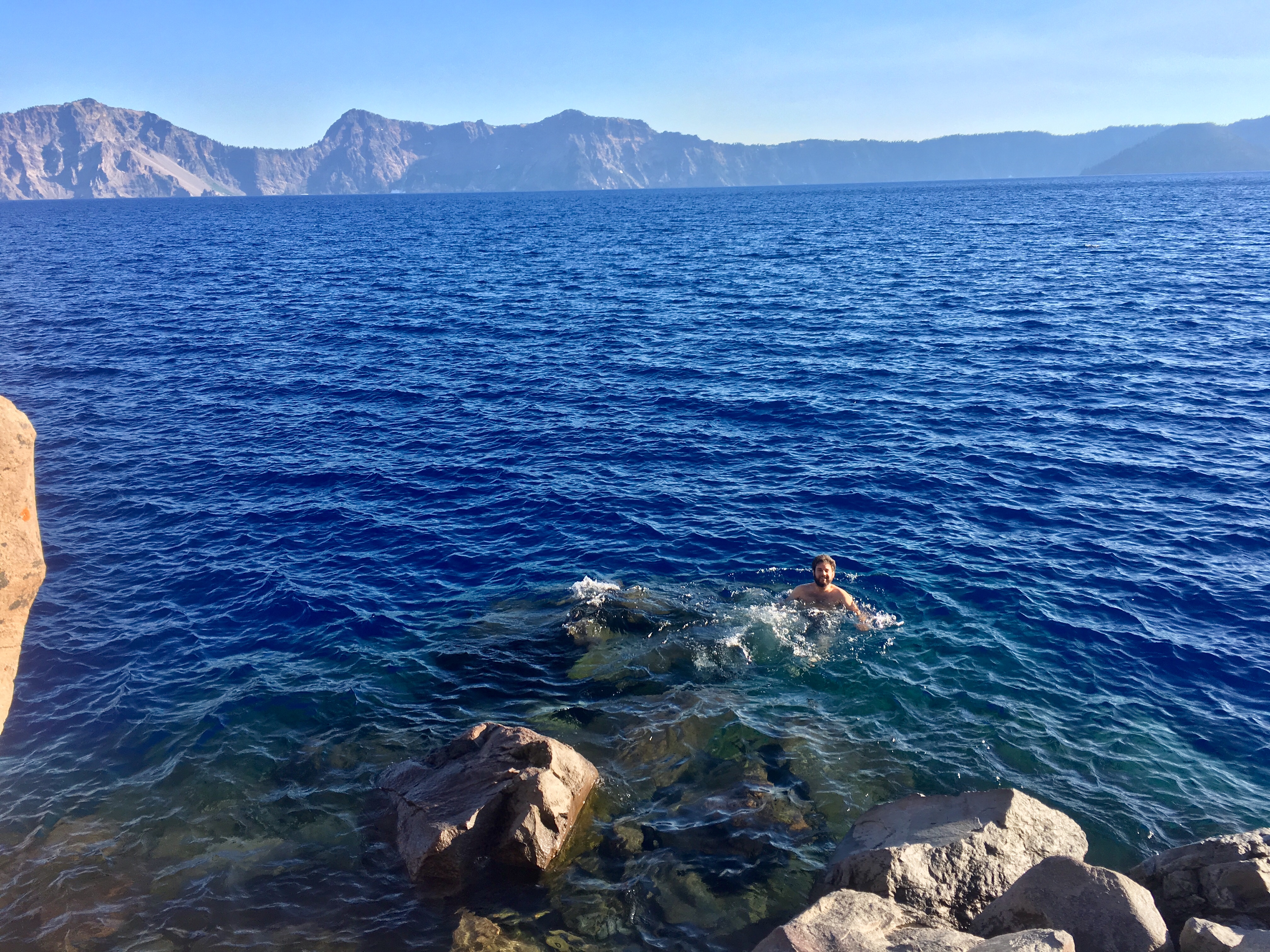 Josh swimming in Crater Lake. The deepest (1,949 ft deep) and most pristine lake in the USA. It was formed by a violent volcanic eruption 7,700 years ago.