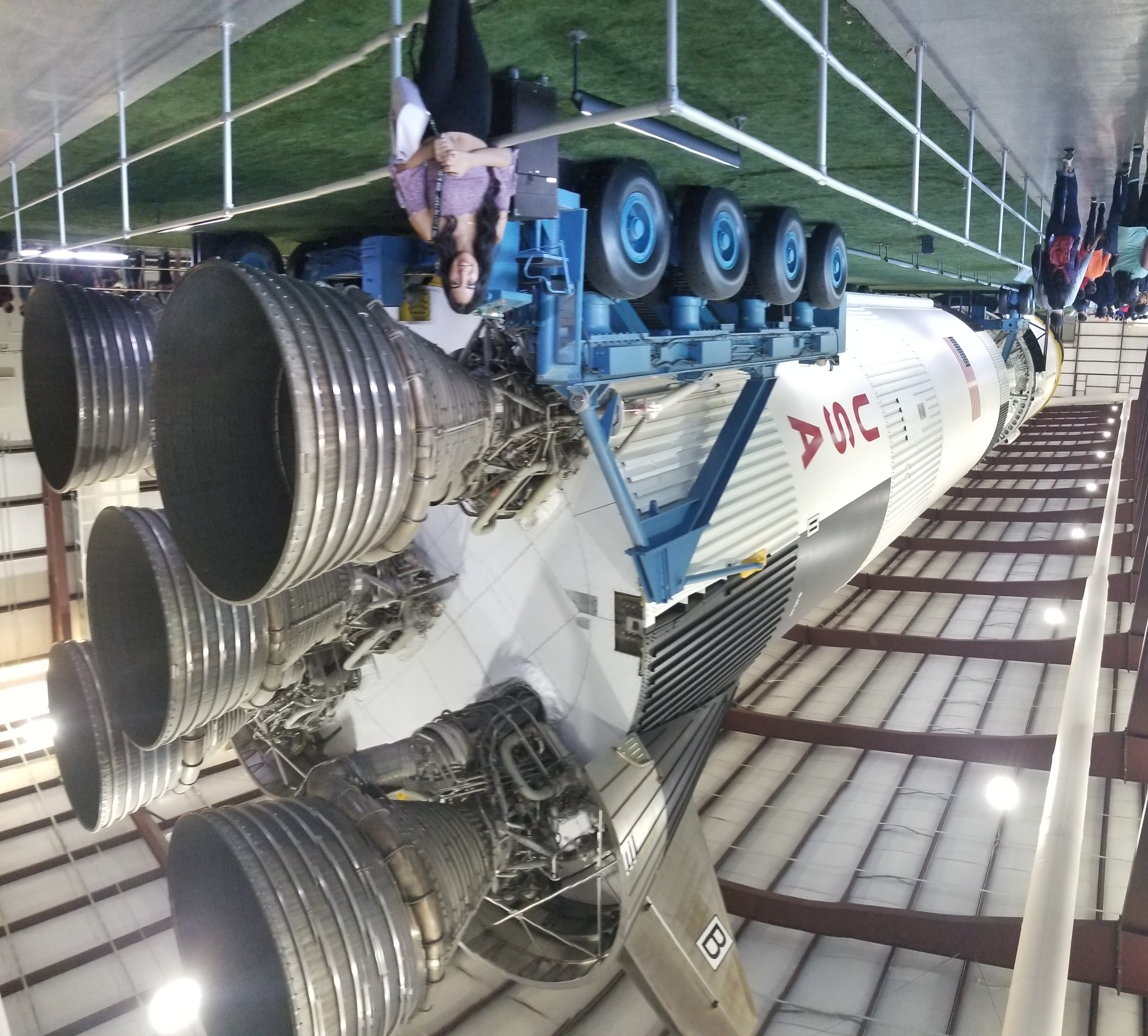 Standing in front of a Saturn V rocket at the Houston Space Center.