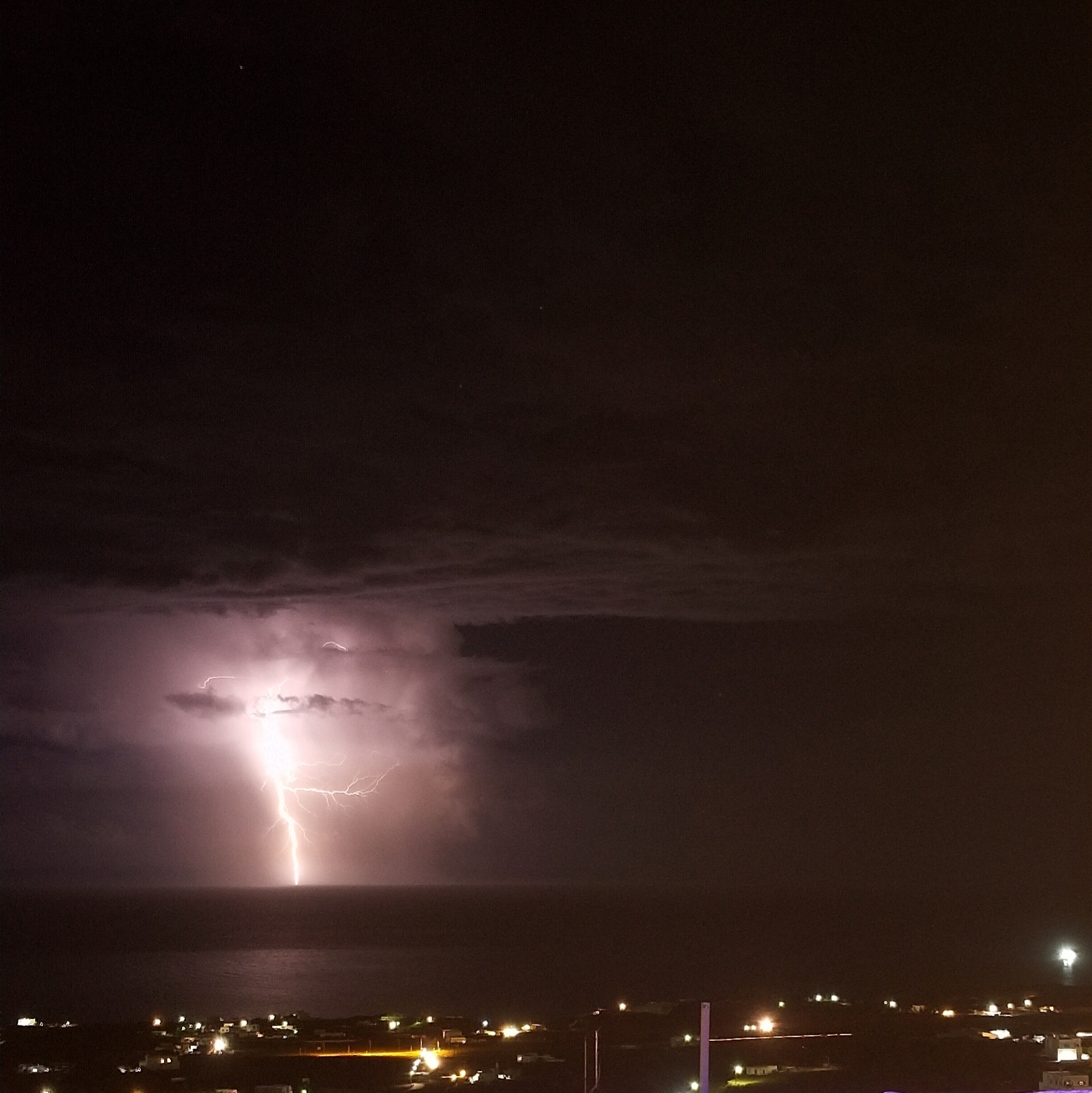 A thunderstorm at night in Santorini, Greece