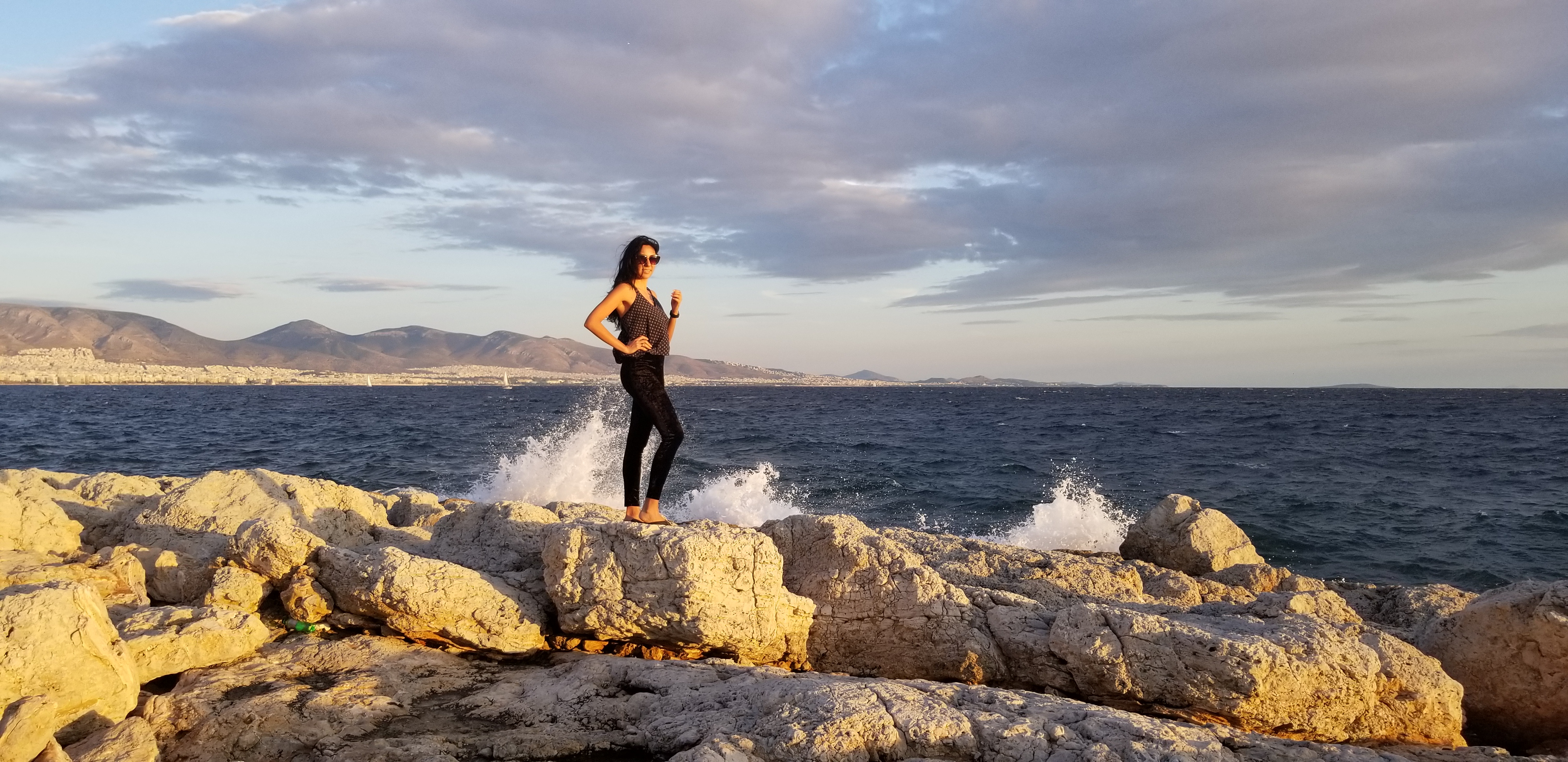 Zelzah almost gets splashed by waves in Piraeus, Greece