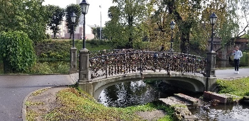 Love Lock Bridge in Riga. Couples engrave their initials onto padlocks which they then lock around the bridge.