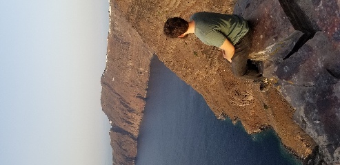 The end of the hiking trail in Santorini was a ledge with a spectacular view over the caldera.