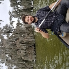 Josh wondering why I'm taking pics and not paddling