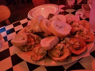 Trying some chargrilled oysters in New Orleans