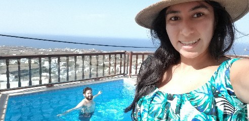 Swimming in / lounging by the pool in Santorini