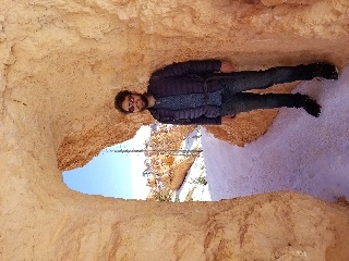 The trail into Bryce Canyon goes through tunnels in the rocks in several places