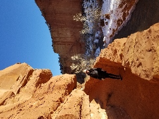 Zelzah starting up the trail to the top of the cliffs in Capitol Reef