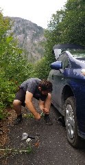 Changing a flat tire in North Cascades NP, Washington. At least the scenery was nice.