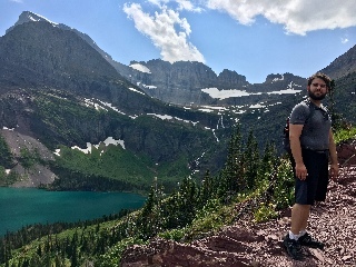 Josh trying to be America’s Next Top model on our hike towards Grinell Glacier (behind him). Super blue Grinell lake pictured as well. In Glacier NP