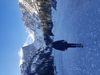 Standing on frozen Emerald Lake in Rocky Mountain National Park