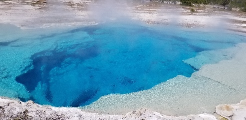 Very deep, clear pool in Yellowstone NP. Would want to swim in it if it wasn't made of boiling water.